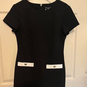 Tommy Hilfiger black short sleeve dress with white pocket accents.